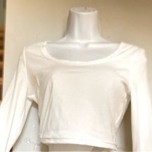 Cute low necked white long sleeve crop T